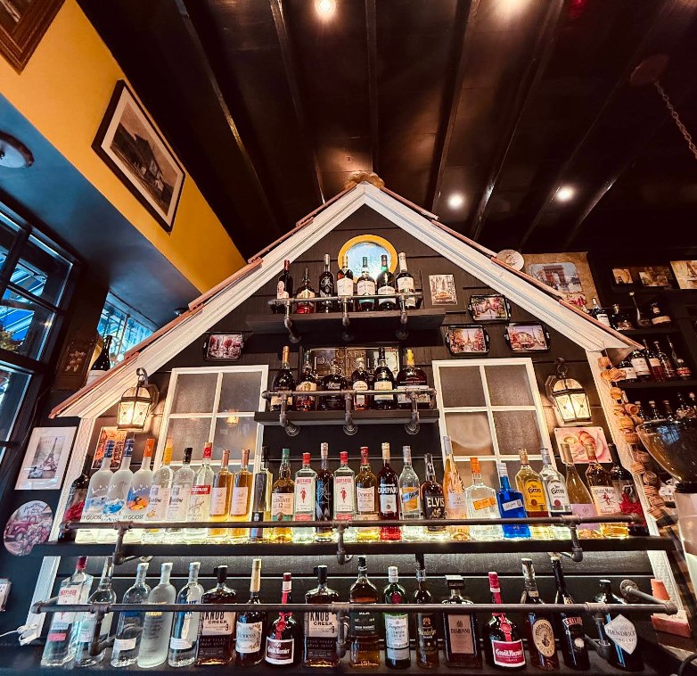 The bar at Parisienne Cafe stocked with spirits, liqueurs and coffee equipment