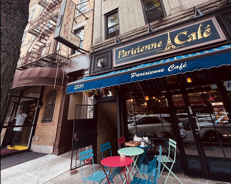 Parisienne Cafe storefront with blue striped awning on Arthur Avenue, Bronx